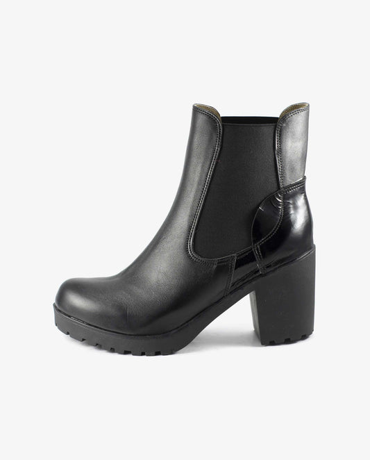 VelocityVogue Black Heeled Ankle Boots